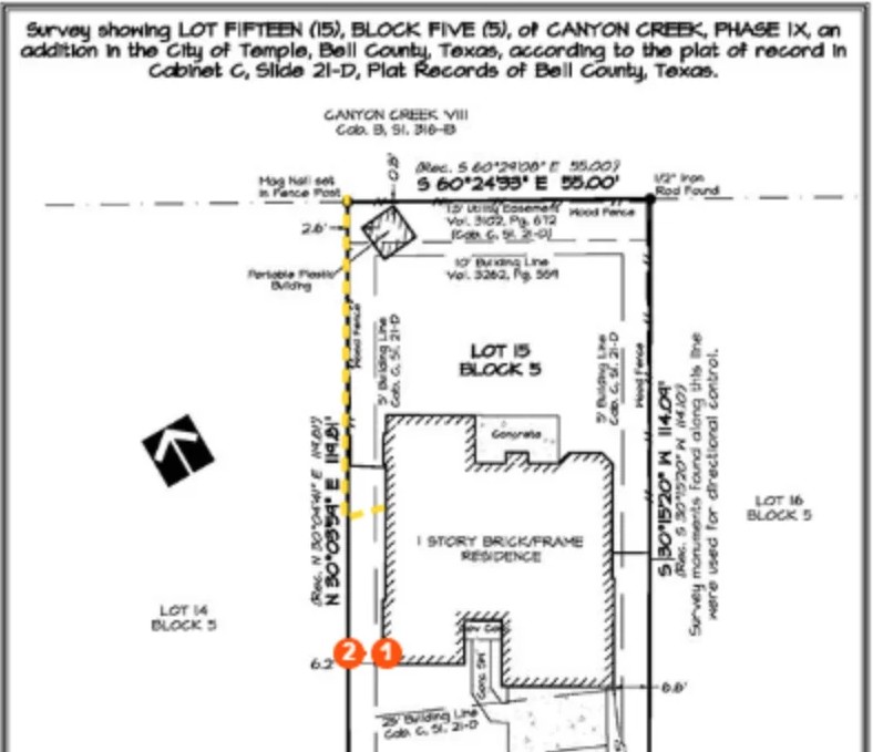 An uploaded county survey plat with a fence line traced along the property edge