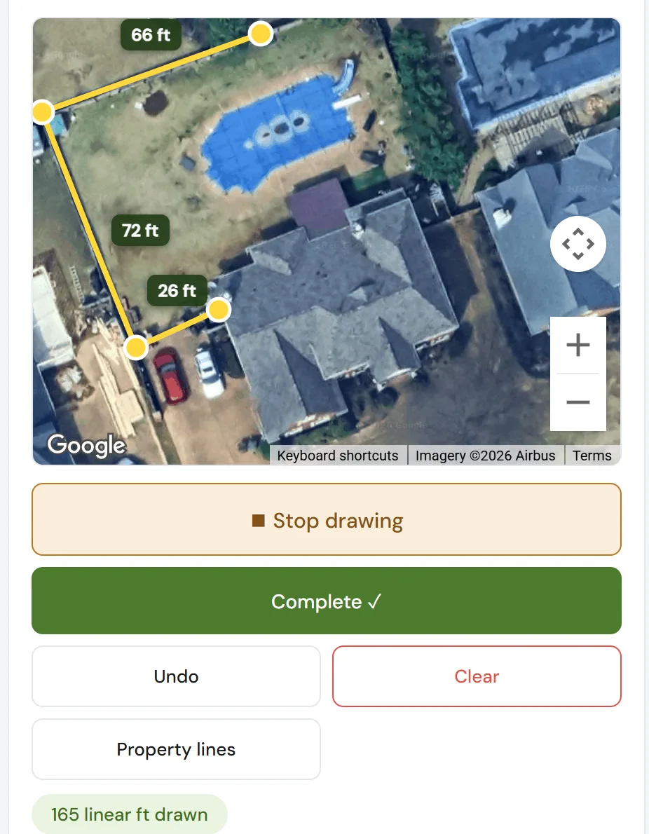 Satellite aerial view of a backyard with pool showing a 165 foot fence line traced around the property